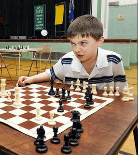 angry kid_playing_chess